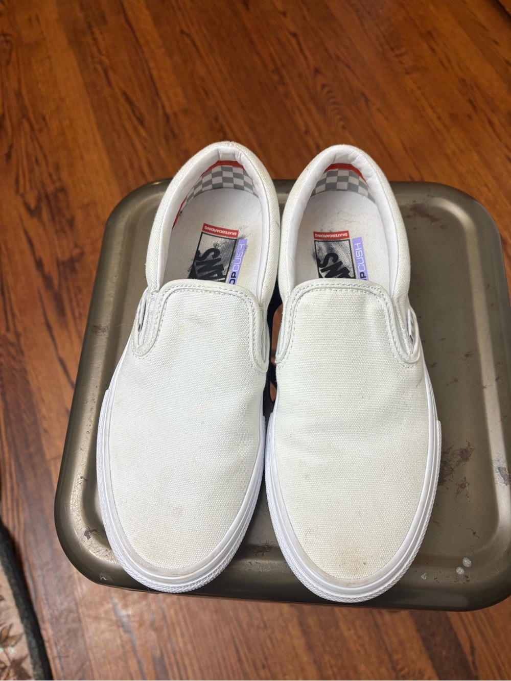 Vans men’s Classic Slip-On Sneakers in White